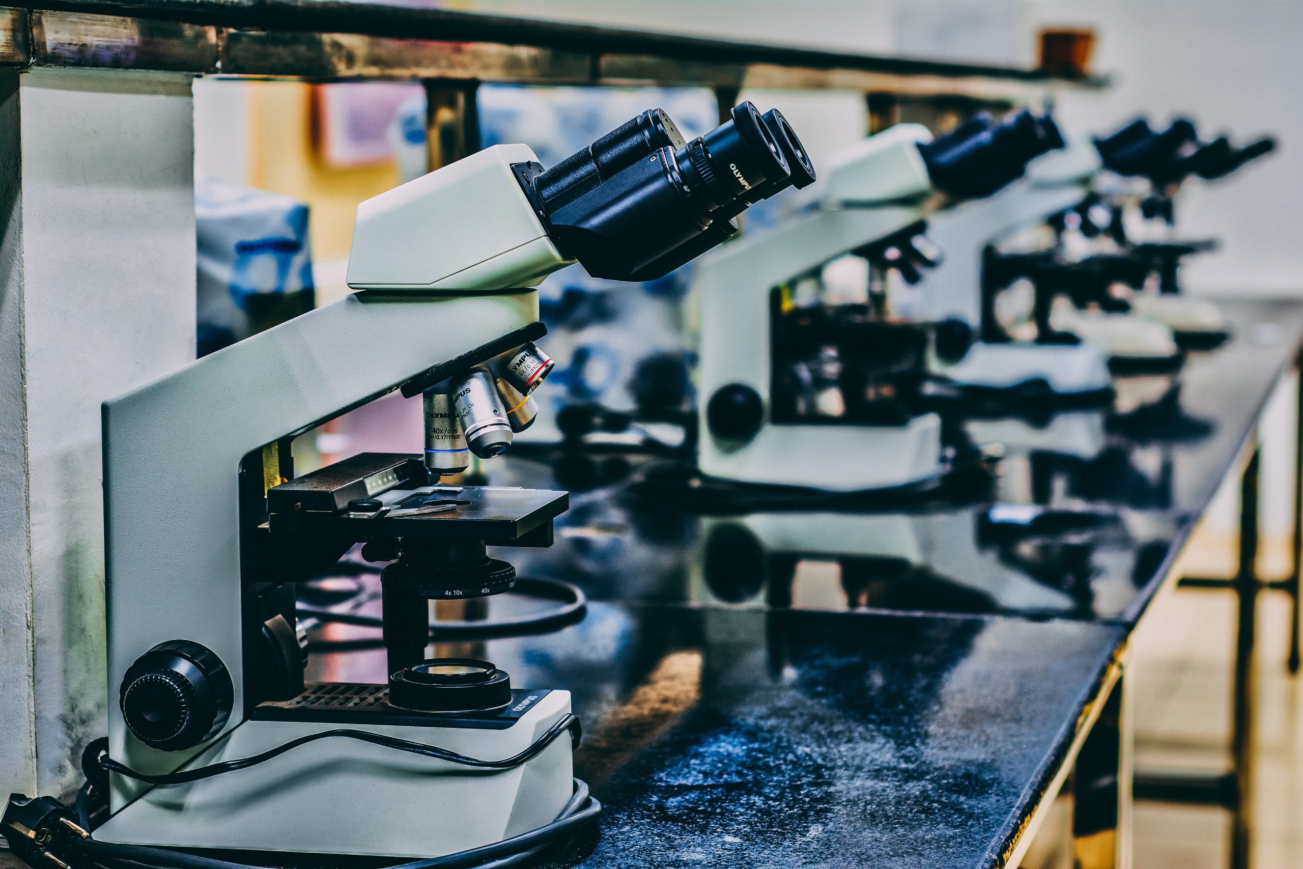 Close up of microscopes in classroom lab.